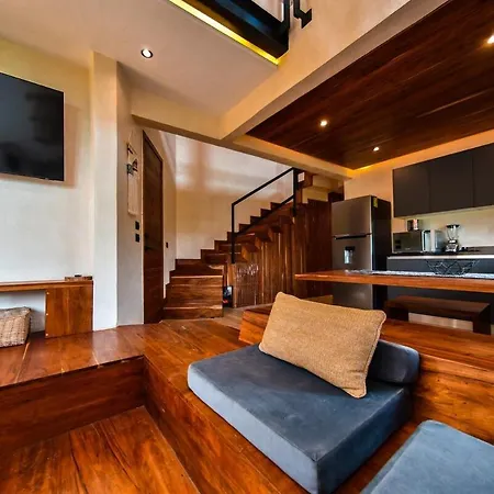A Double-Height Apartment With A Private Pool